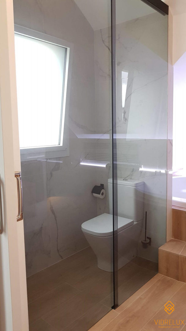 divisoria cristal negro baño